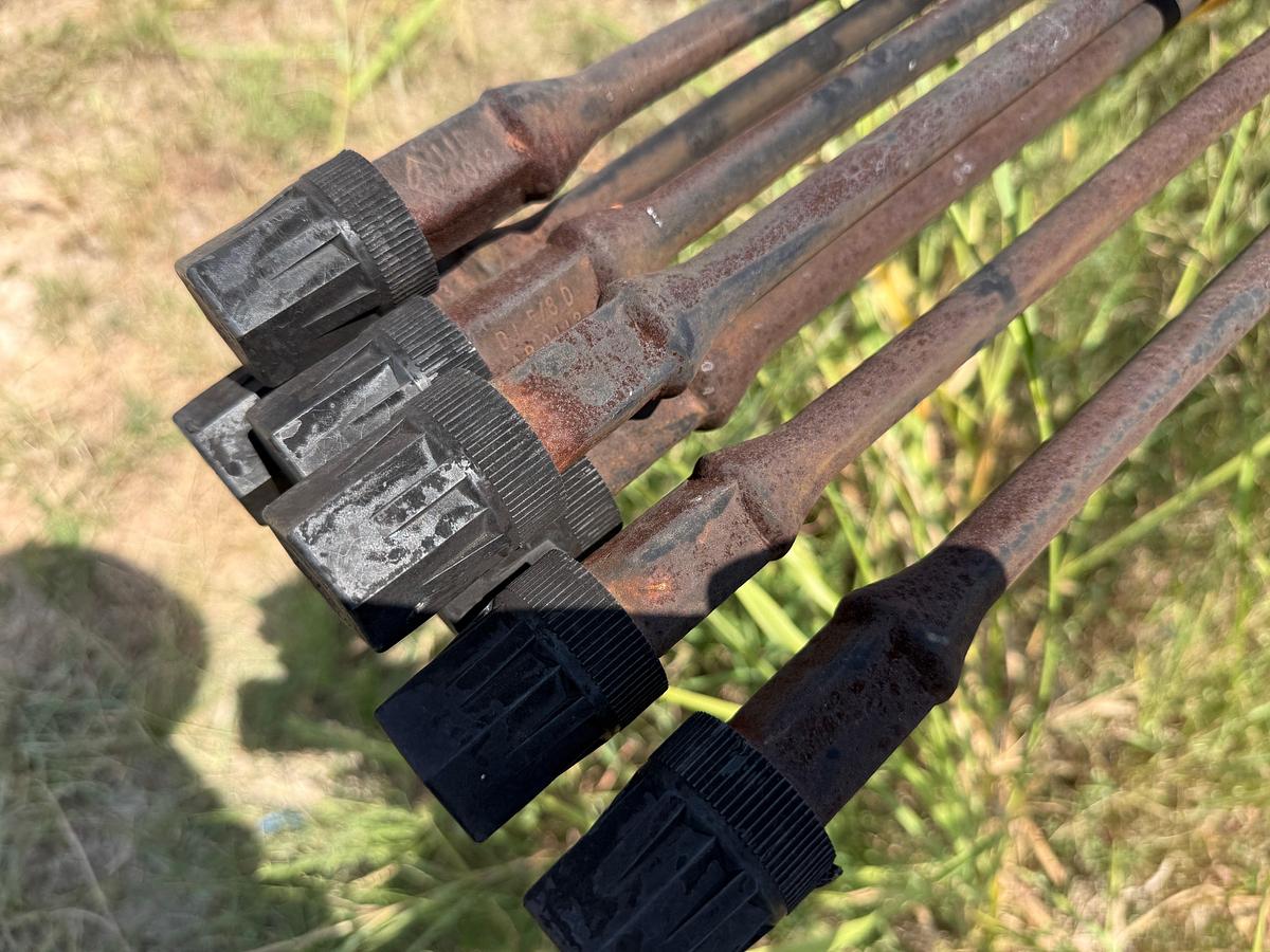 Used LOT W/ (19) UNUSED 5/8” x 25’ SUCKER RODS & (2) PIPE RACKS