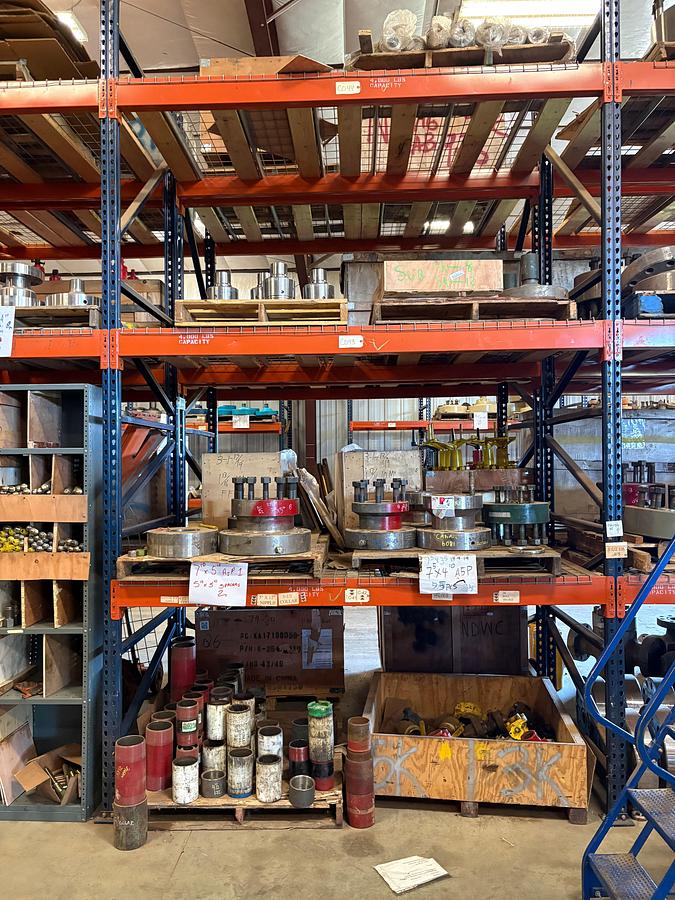 Used Contents of (4 shelves) w/ (8) assorted single & double stud adapters, pipe nipples, landing flanges, tension hangers, etc