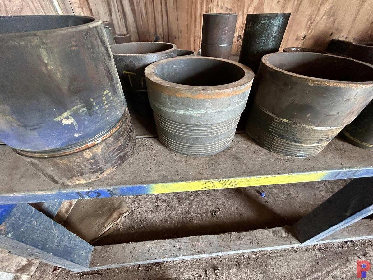 Used 2-SHELVES W/ (60 +) 1-1/2” - 8” STEEL THREAD PROTECTORS