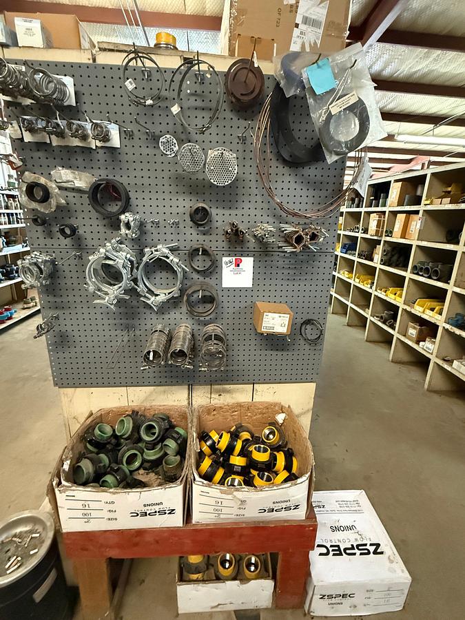 Used END CAP SECTION OF (50+) ZSPEC 2” FIG 100 PIPE UNIONS & PEG BOARD W/ VARIOUS STEEL CLAMPS