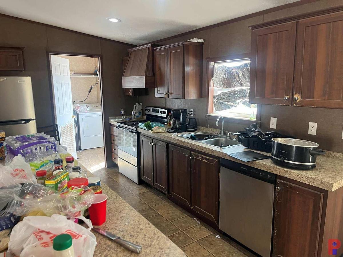 Used 2012 OAK CREEK 60’ X 30’ 4-BED 2-BATH DOUBLE WIDE MOBILE HOME