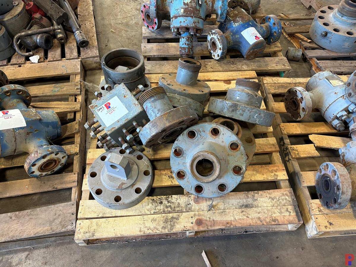 Used PALLET W/ (6) 4” WECO FLANGES, (2) LIFT FLANGES, & (1) 2” 4-WAY FLUID CROSS