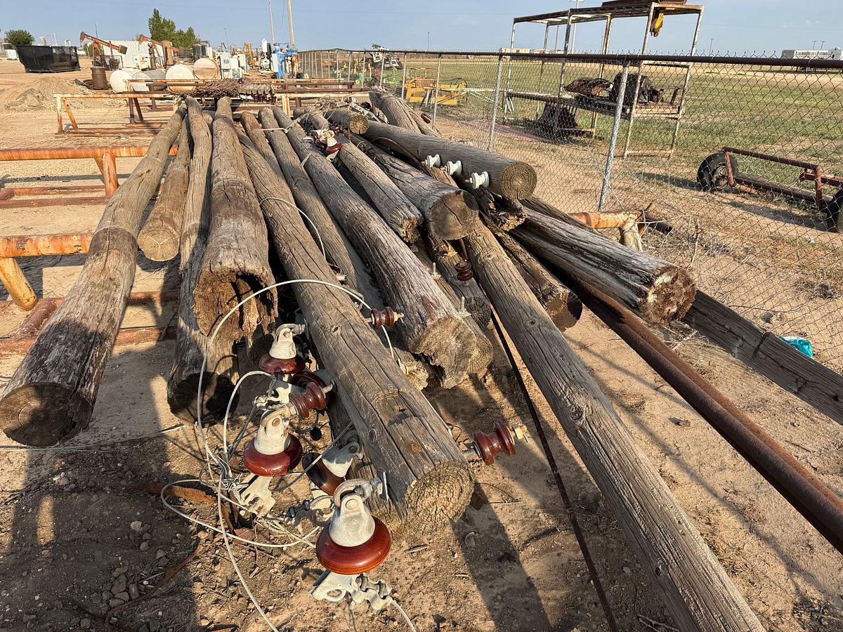 Used LOT OF (20) 11” DIA X 25 to 35’ OLDER TELEPHONE POLES