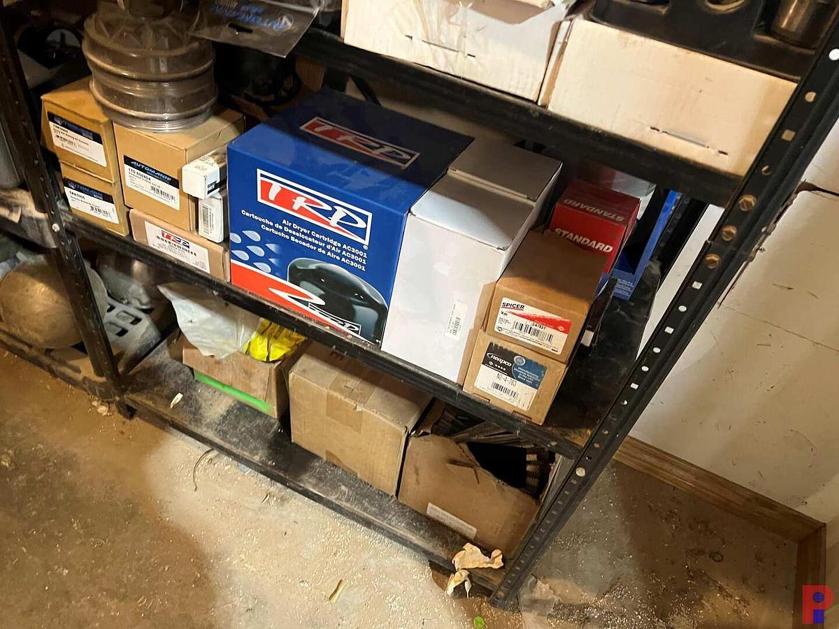 Used 9 - SHELVES CONTAINING TRANSMISSION FLUID, MOTOR OIL, BRAKE FLUID, GREASE, PURGE VALVES, & SEE DETAILS
