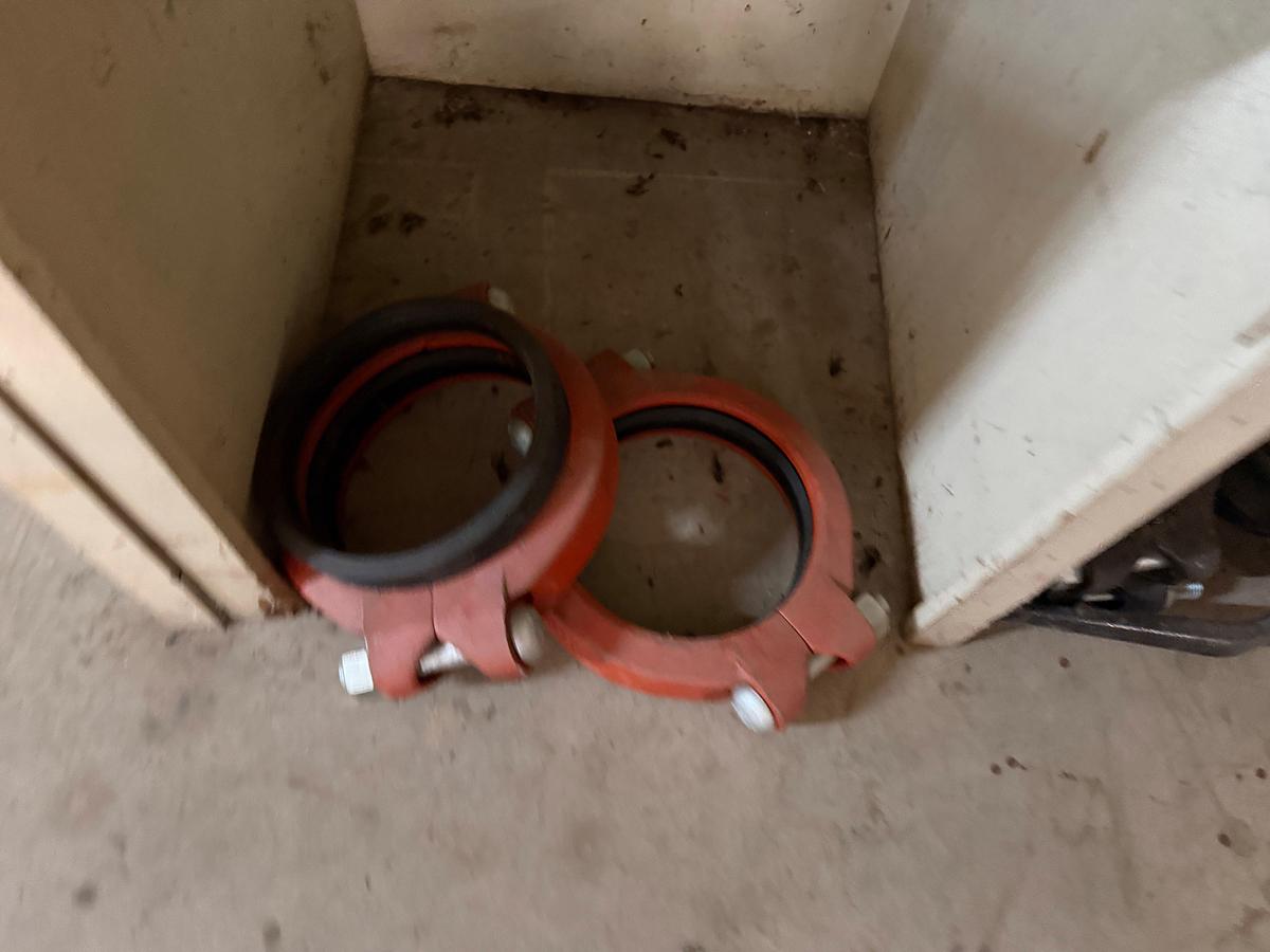 Used SECTION OF MOSTLY HEAVY WALL PVC & STEEL FITTINGS, VICTAULIC COUPLERS, SWAGES, COLLARS, NIPPLES, (3) 2” JAYCO VENT VALVES