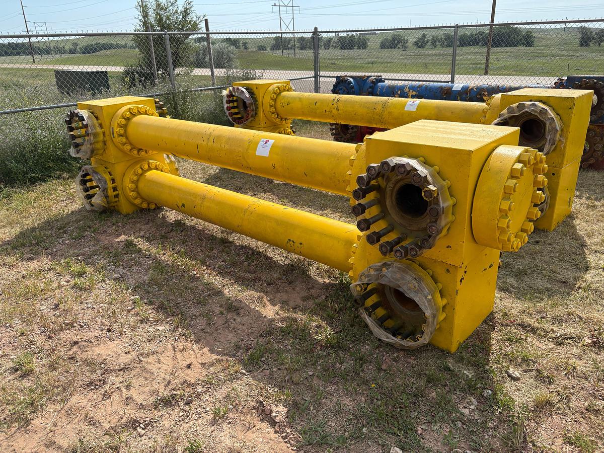 Used (2) 7-1/16” x 10’L spacer spools w/ (4) fluid crosses