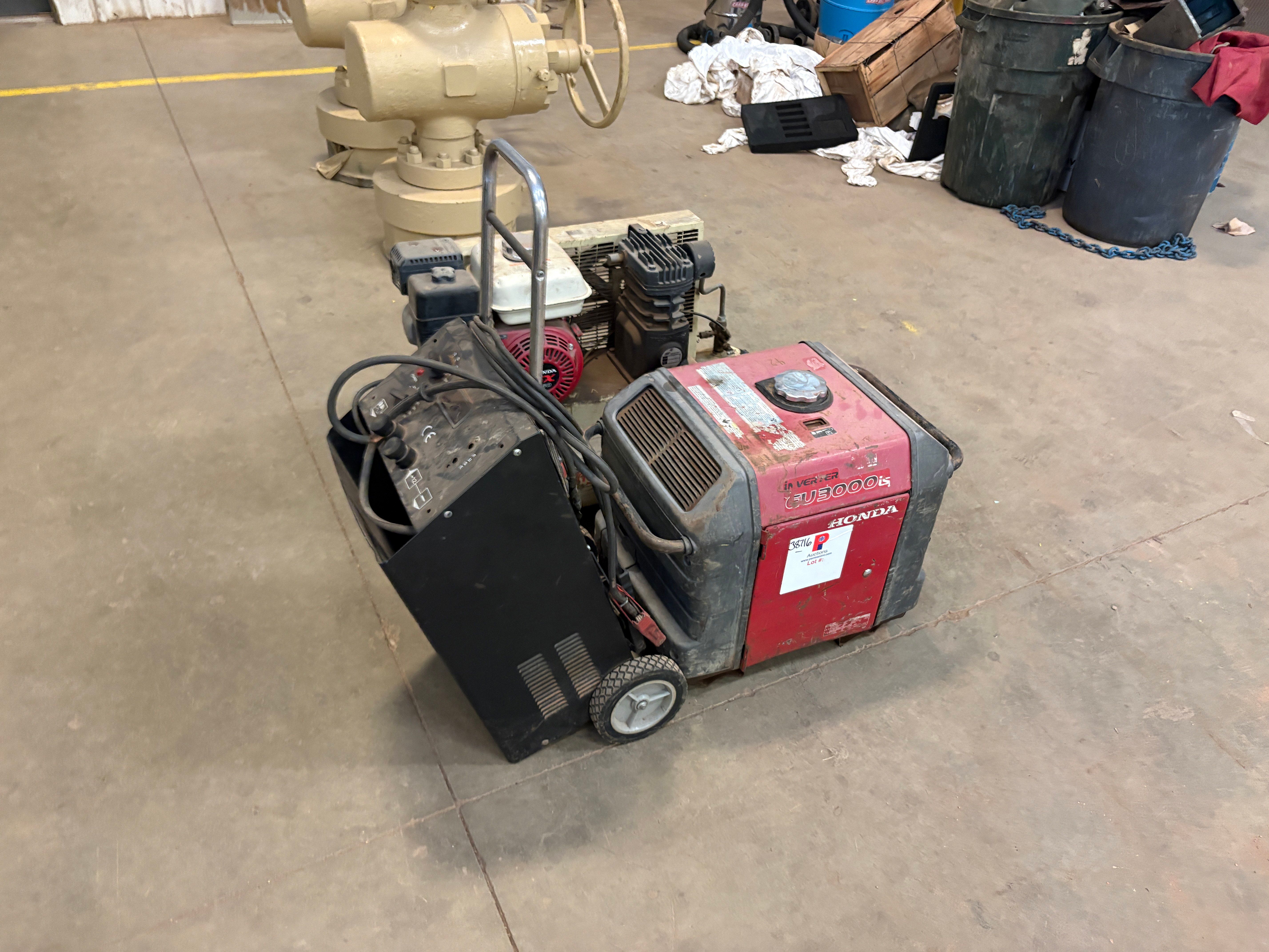 Used Honda eu3000is inverter generator, stark monster battery charger, & ingersoll Rand S9-8 air compressor