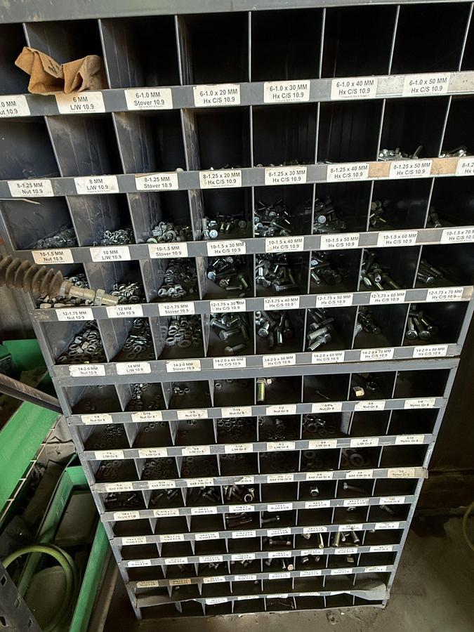 Used (1) 112-BIN BOLT BIN, (1) 77”L X 24”W X 78”H 4-SHELF RACK, (10) DURHAM SLIDE-OUT COMP. BOXES, ALL W/ TRUCK PARTS & RELATED