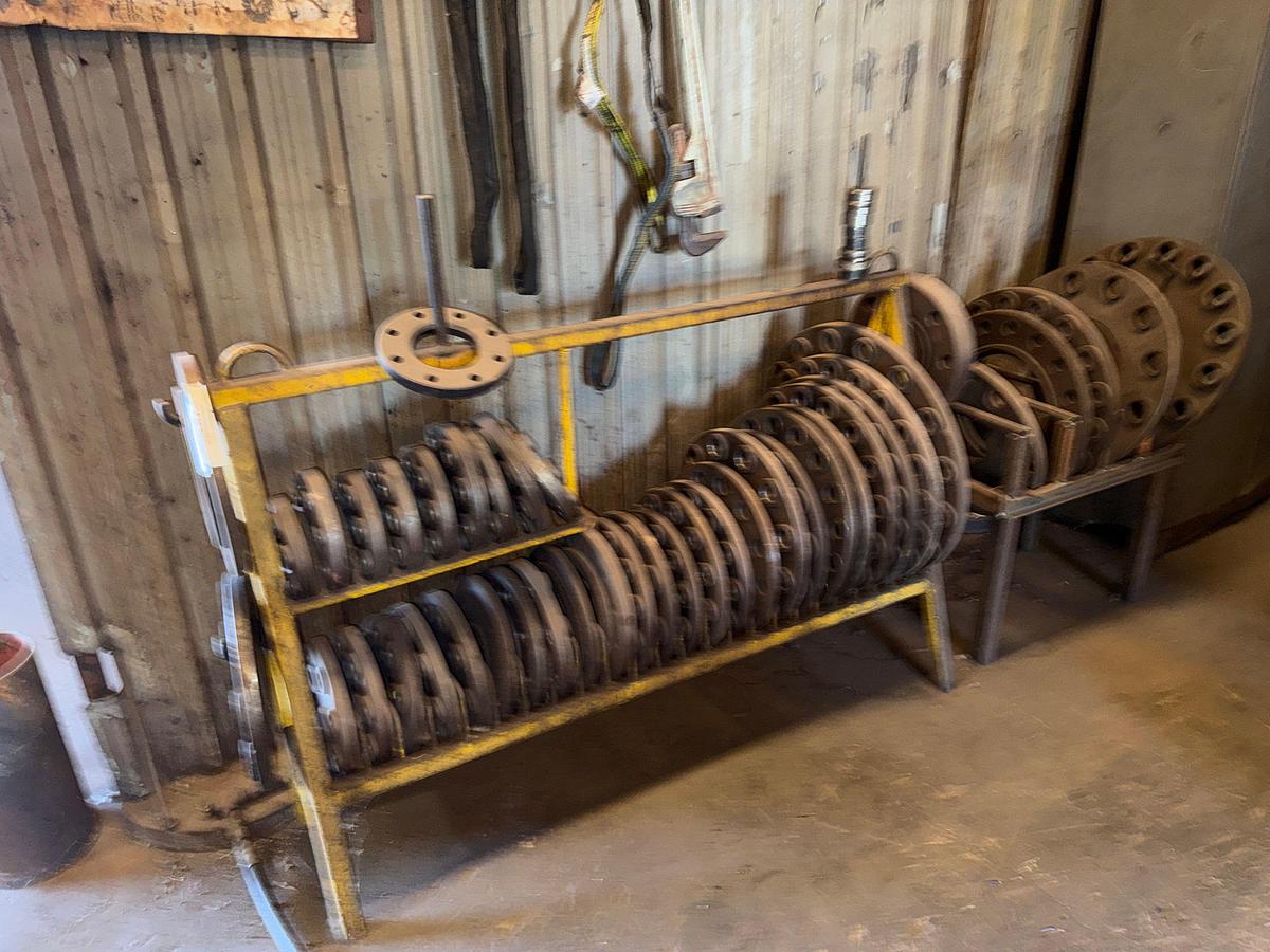 Used SECTION OF (2) WELLHEAD SPACER FLANGE RACKS W/ (25+) 6”-26” FLANGES