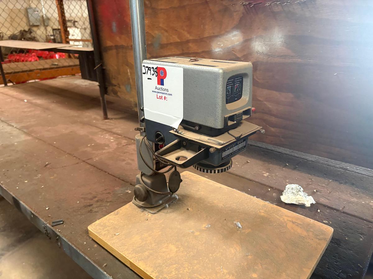 Used 10’ x 57” x 3’ shop table W/ durst 606 drill press, 4-drawer filing cabinet, & 90” x 45” storage rack