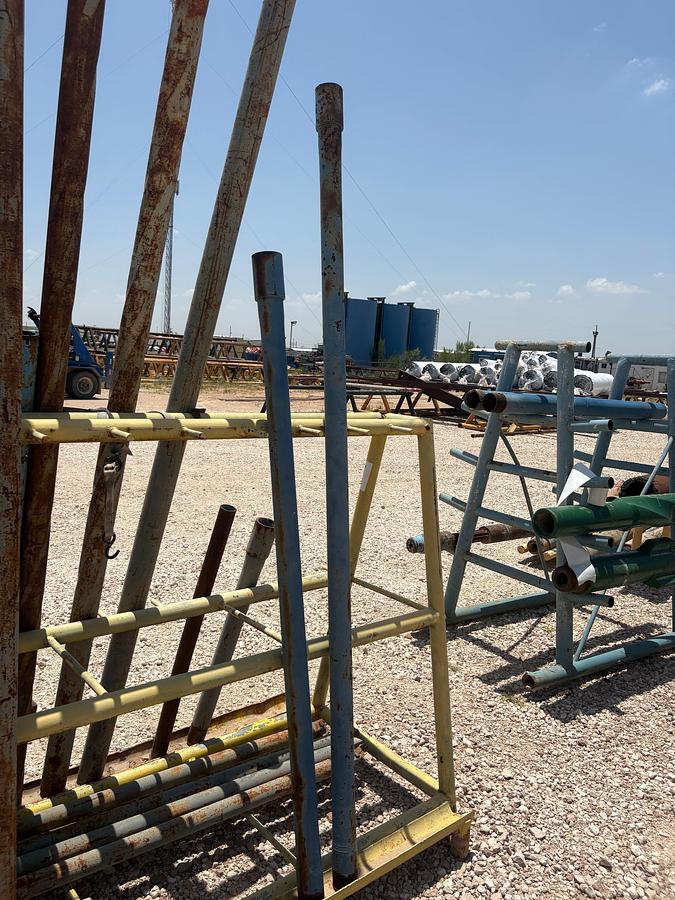 Used 10’ x 3.5’ x 5’ A-frame tool rack W/ assorted tubing pup jts, drain subs, stock pipe, etc.