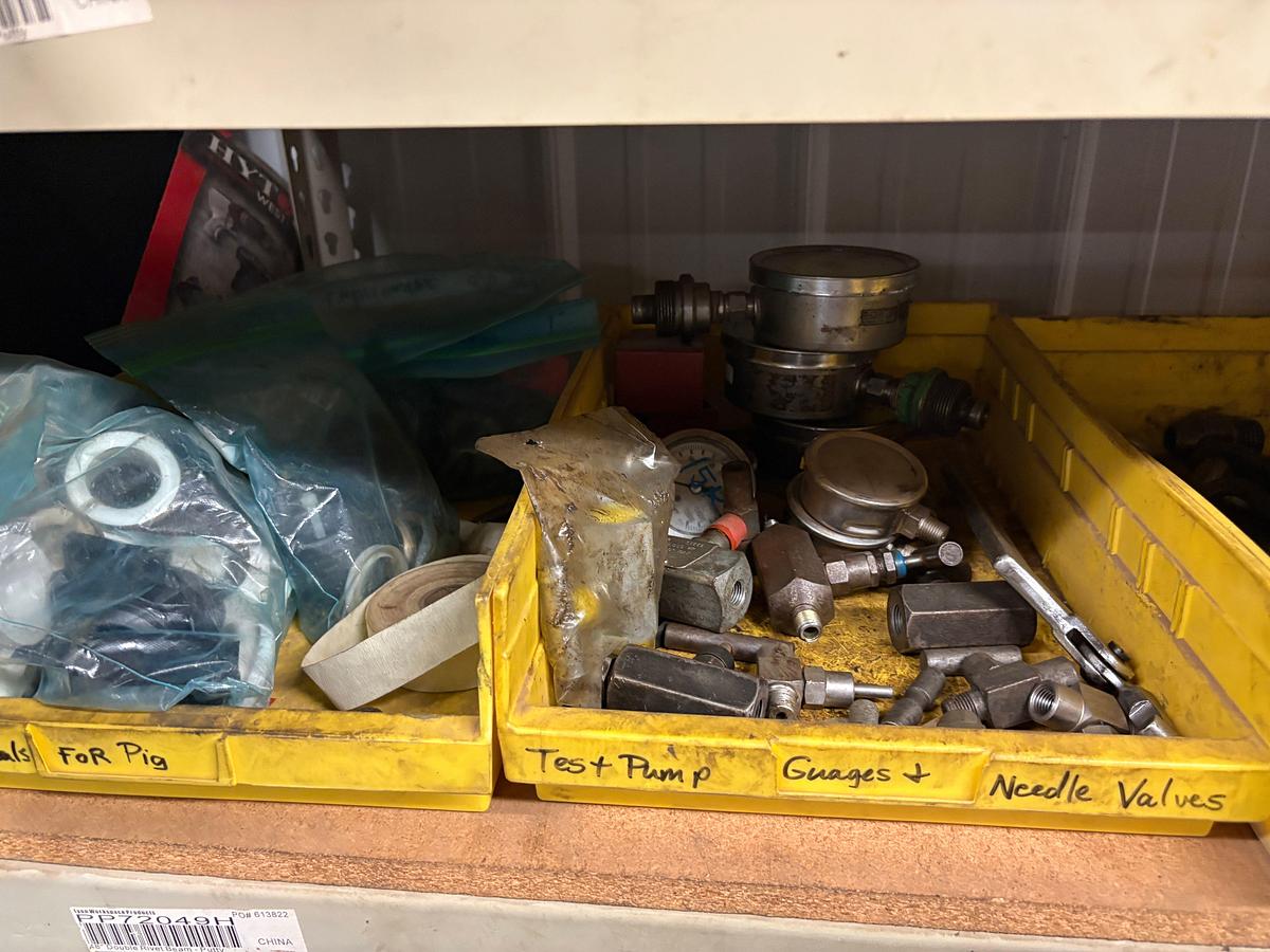 Used 4’ x 2’ x 6’ shelving w/ assorted test pump gauges, needle valves, hydraulic fittings, packing/seals, toolboxes, etc.