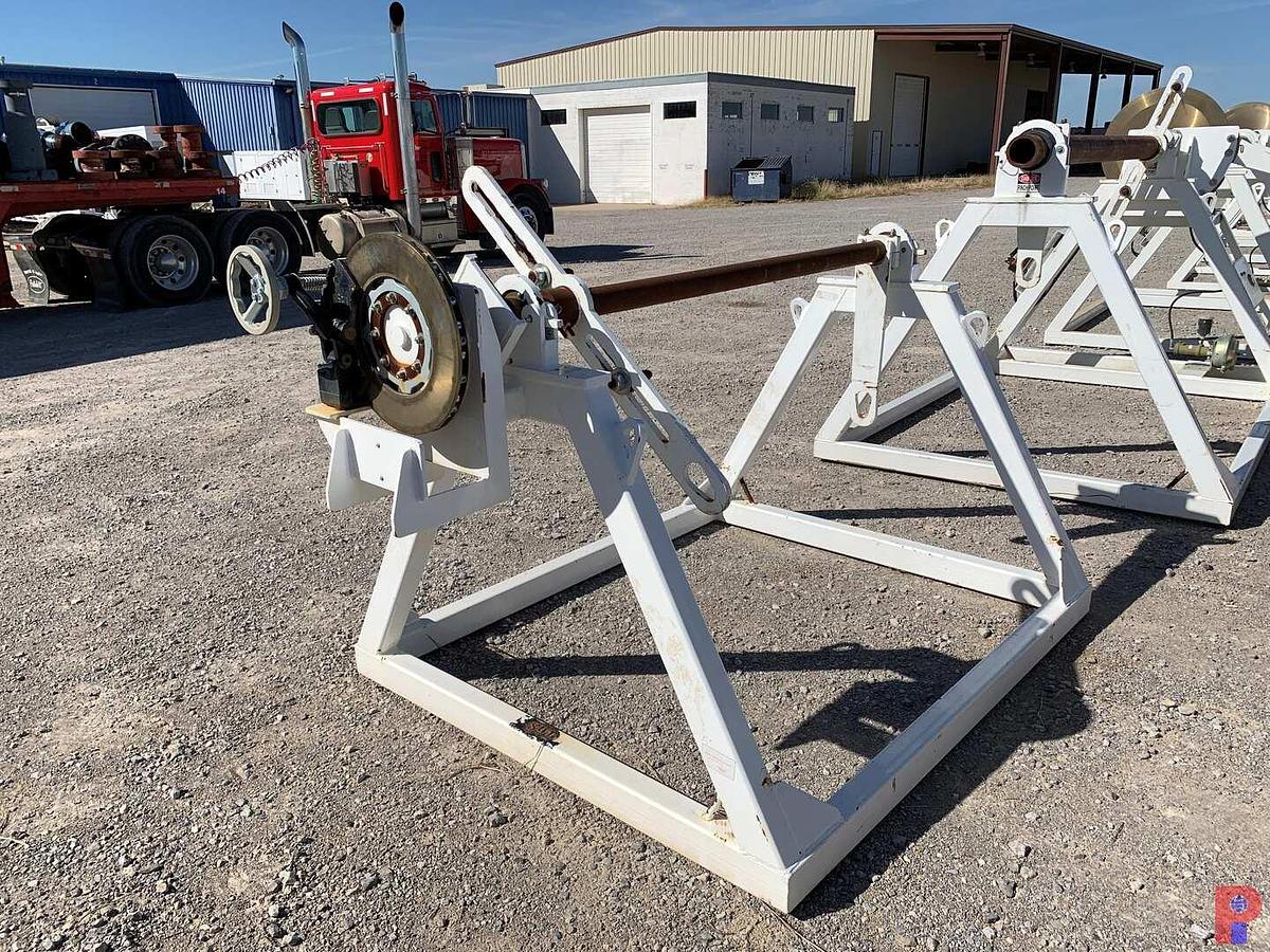 Used 66”W X 48”H REEL STAND W/ ADJUSTABLE 16” BRAKE CALIPER
