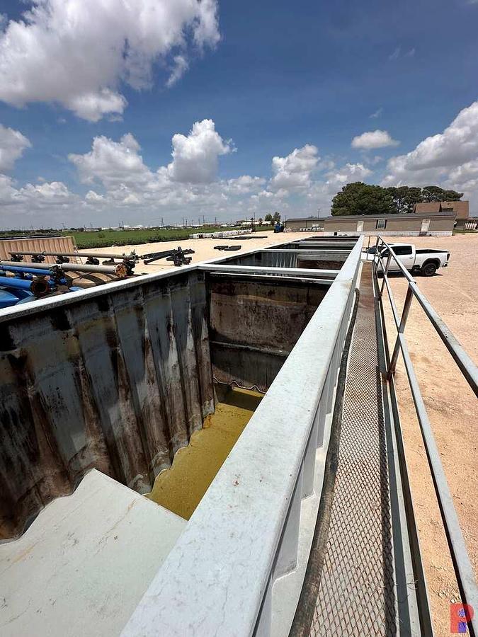 Used 500 BBL. WHEELED WEIR TANK W/ LINER