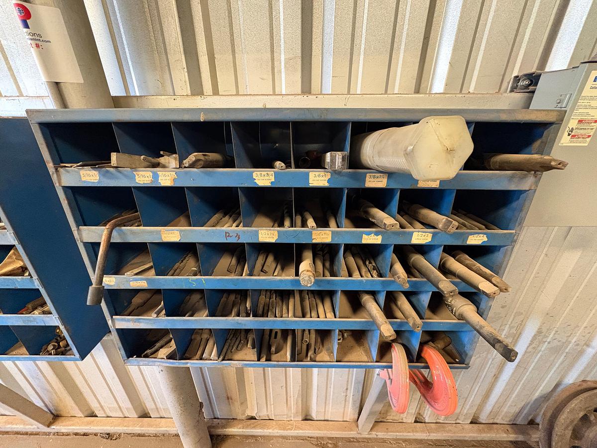 Used 37” x 26” x 34” table w/ assorted drill press chucks, drill bits, tap & dies, & assorted bolts