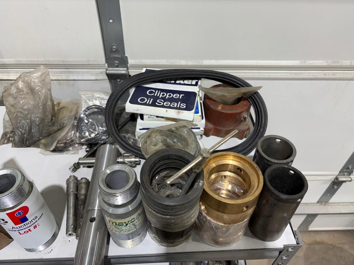 Used Shelving unit w/ (UNUSED) XK-90 & Logan swivel parts, stabbing guides, Kelly valve kits, guages, etc