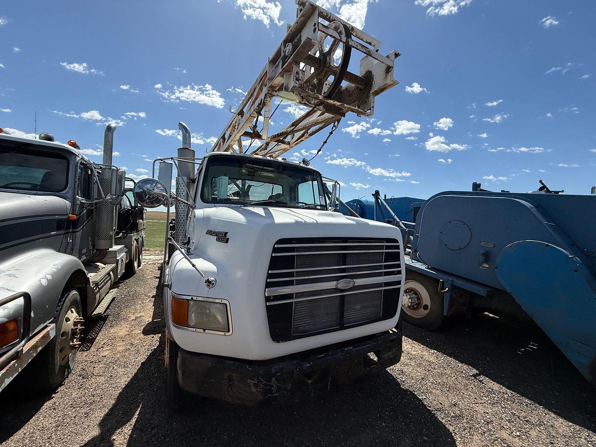 Used FRANKS EXPLORER II SWAB RIG MTD ON 1994 FORD L9000 T/A TRUCK