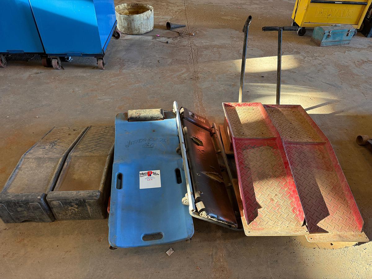 Used (2) WHEELED VEHICLE RAMPS, (2) SMALL RAMPS, (4) CREEPERS