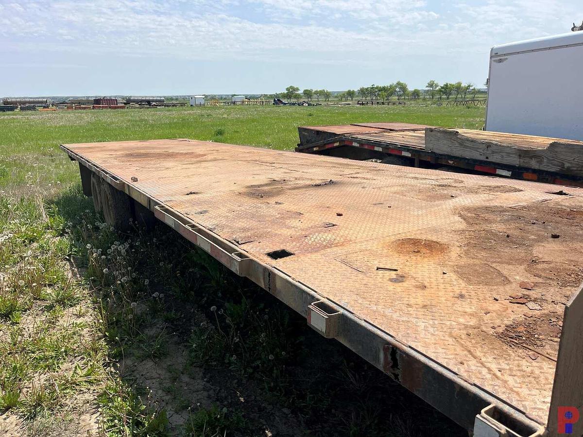 Used SHOPBUILT 32’ GN FLATBED TRAILER