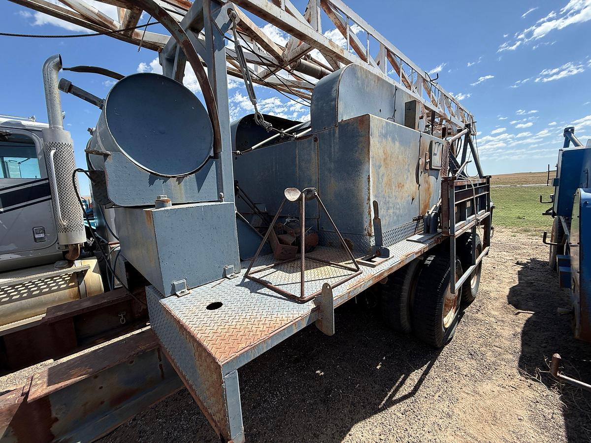 Used FRANKS EXPLORER II SWAB RIG MTD ON 1994 FORD L9000 T/A TRUCK