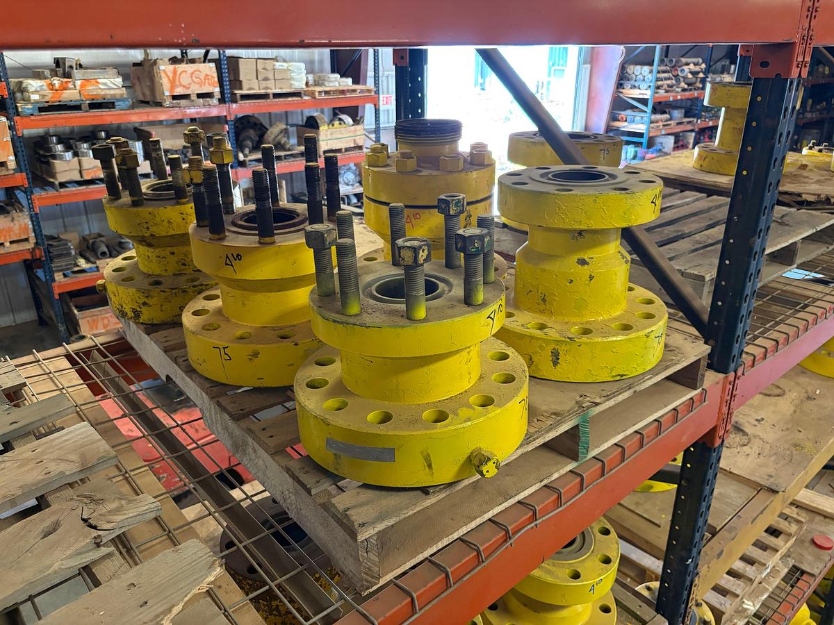 Used (4 shelves) w/ assorted 4” to 7” spools, single stud adapters, & 5” 10k blind flanges