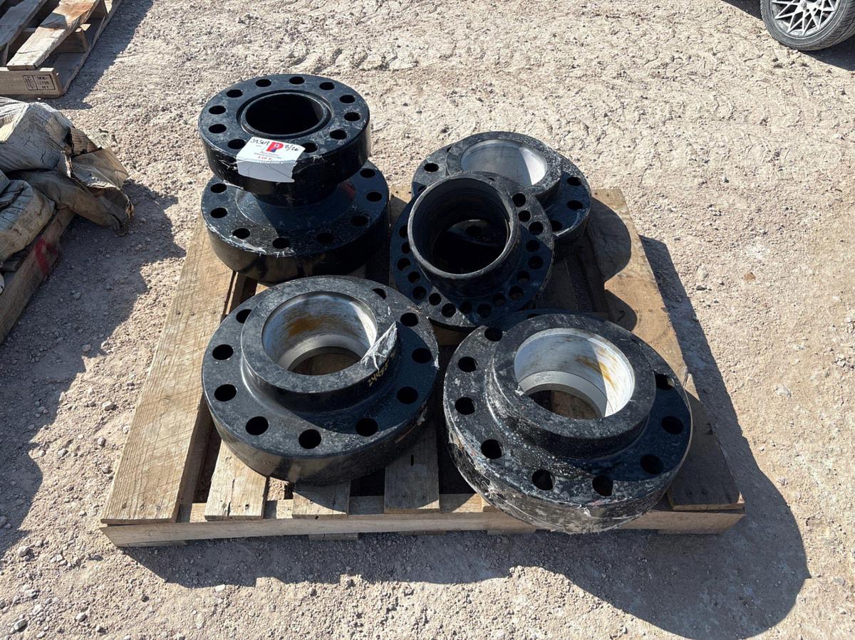 Used (1) 7-1/16” x 13” spacer spool & (4) assorted companion flanges