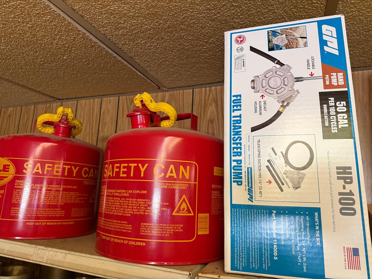 Used TOP SHELF W/ (3) 10-GAL IGLOO DRINKING COOLERS, (1) GPI ALUM HP-100 HAND PUMP, (2)EAGEL 5-GAL. SAFETY CANs