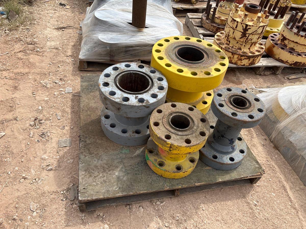 Used (9 pallets) assorted weco flanges, casing packoffs, 2-9/16” gate valves, & (5) assorted spacer spools