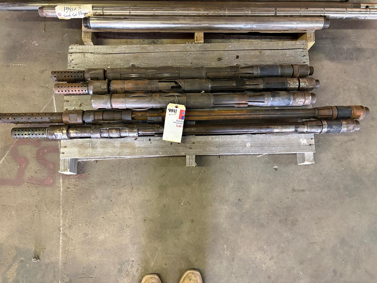 Used (5) 2-1/2” hold-downs f/ down hole pumps