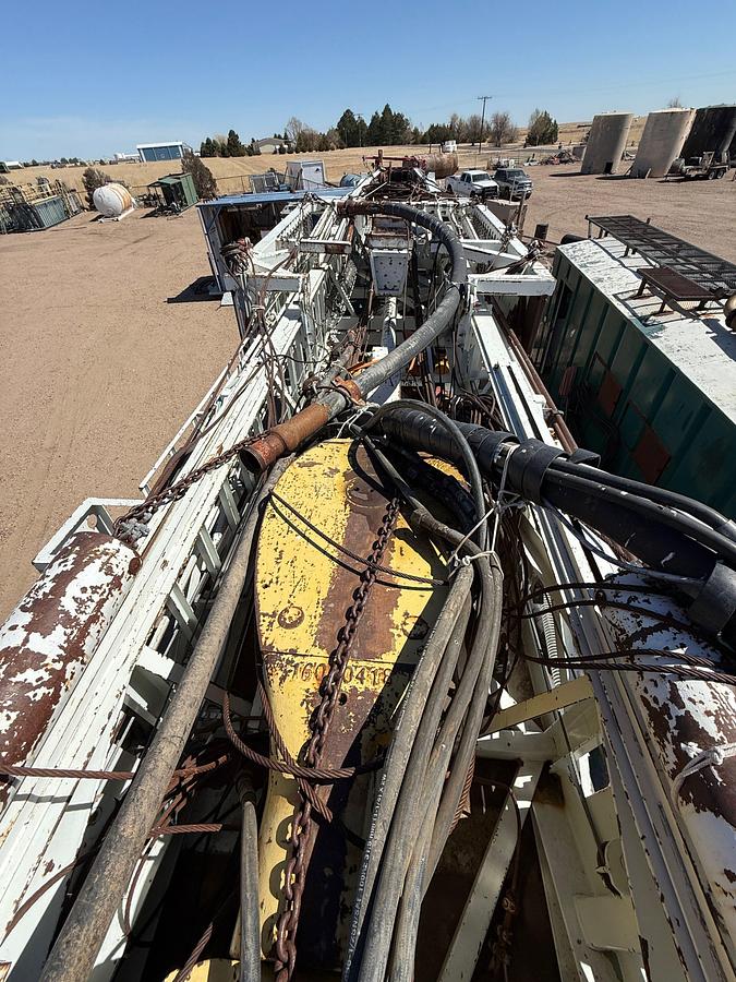 Used 2006 SJ PETRO XJ450 105’-303K LBS. 5-AXLE MOBILE DRILLING RIG