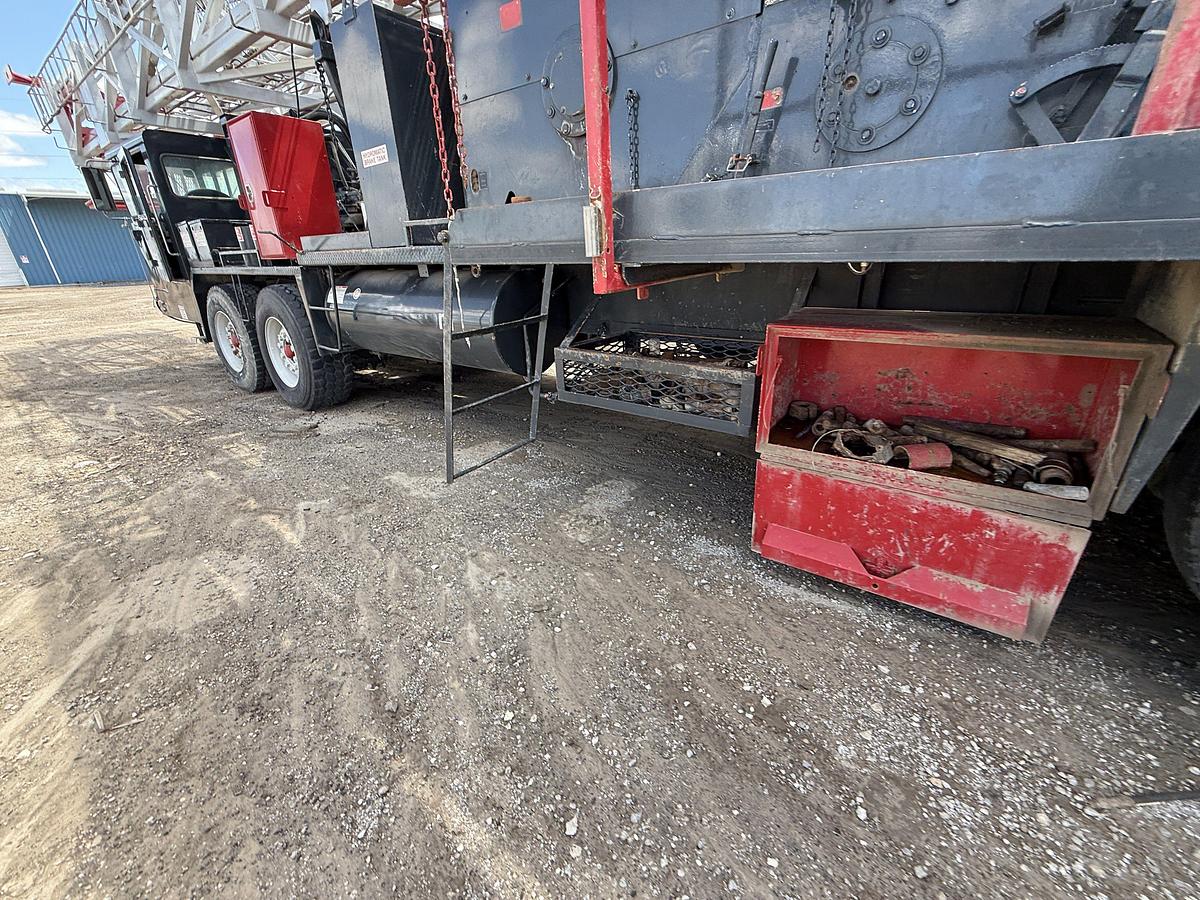 Used FRANKS EXPLORER III 96’-215K 4-AXLE WELL SERVICE WORKOVER RIG