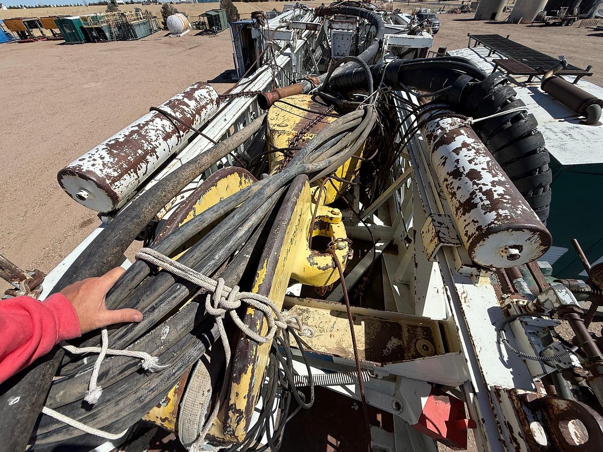 Used 2006 SJ PETRO XJ450 105’-303K LBS. 5-AXLE MOBILE DRILLING RIG