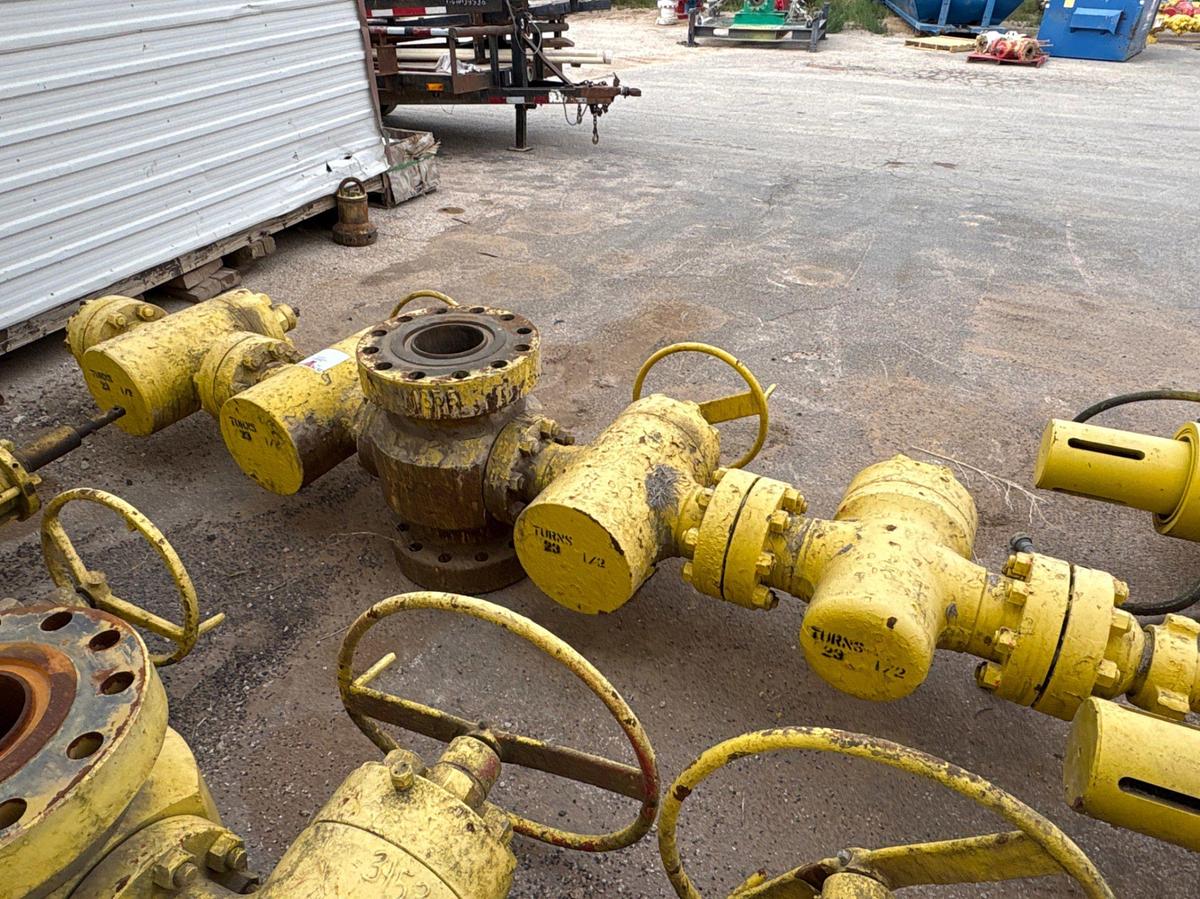 Used 7-1/16” x 4” fluid cross w/ (4) 4” 10k gate valves