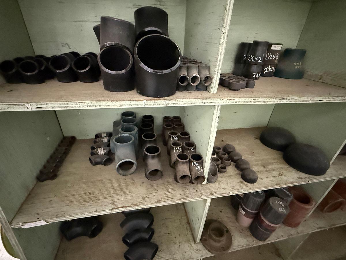 Used SECTION OF (40+) 1” THRU 6” BUTT WELD STEEL FITTINGS, (1) 20” BUTT WELD CAP, & SOME FIBERGLASS FITTINGS
