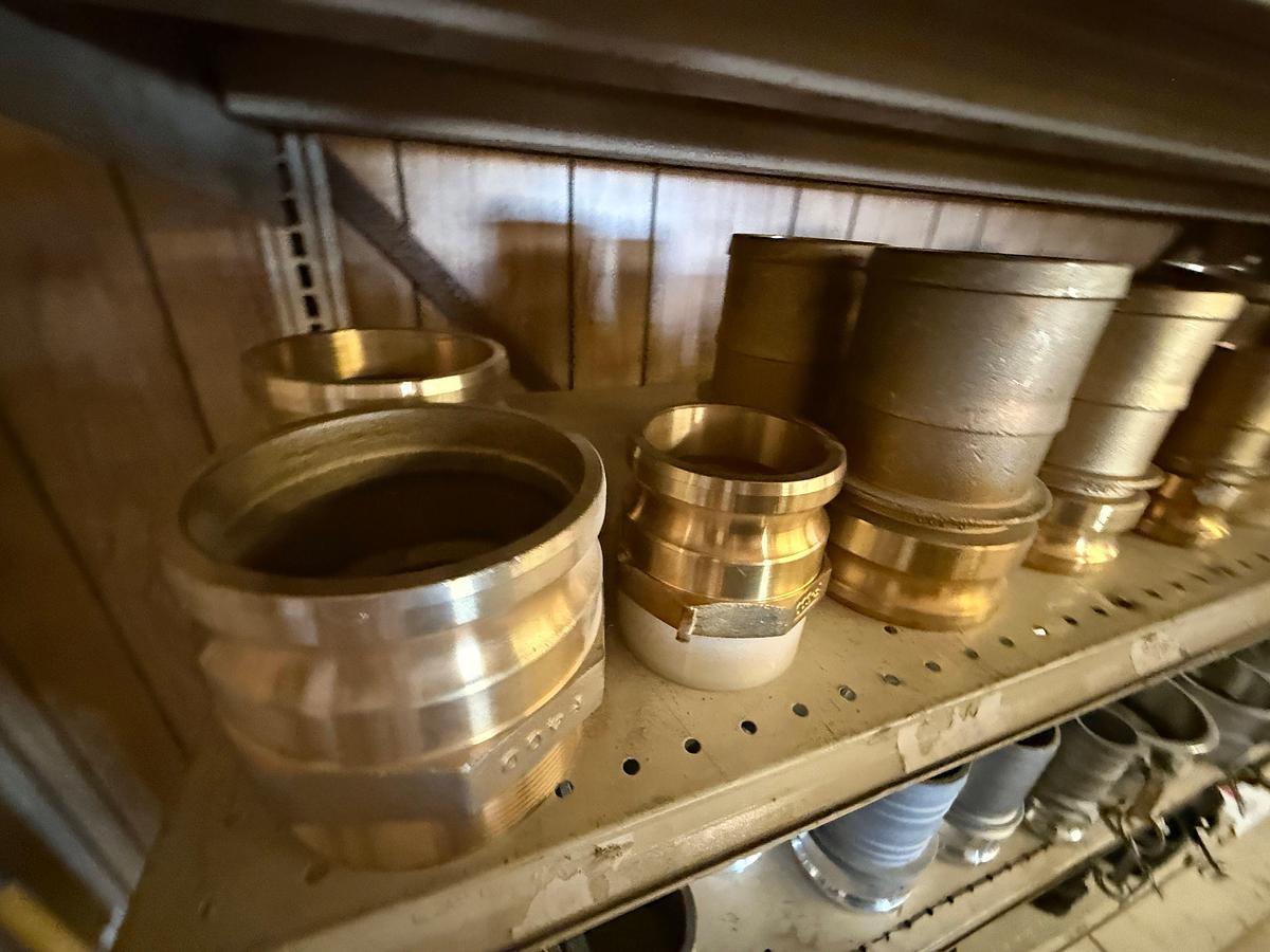 Used 2ND SHELF W/ (25+) 2” THRU 4” CAMLOCK BRASS FITTINGS