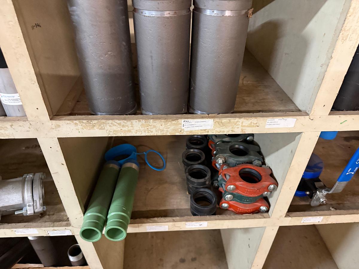 Used SECTION OF MOSTLY HEAVY WALL PVC & STEEL FITTINGS, VICTAULIC COUPLERS, SWAGES, COLLARS, NIPPLES, (3) 2” JAYCO VENT VALVES