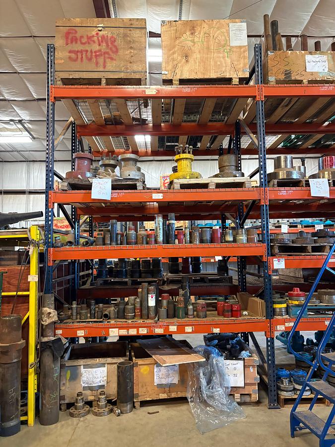 Used Contents of (4 shelves) w/ Assorted single stud adapters, pipe nipples, swages, 1-13/16” & 2-1/16” comp. Flanges, etc