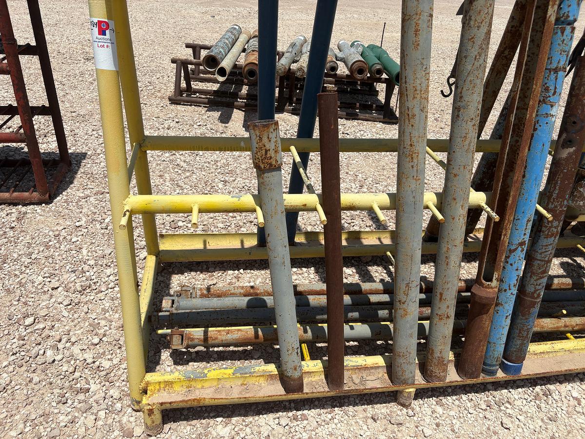 Used 10’ x 3.5’ x 5’ A-frame tool rack W/ assorted tubing pup jts, drain subs, stock pipe, etc.