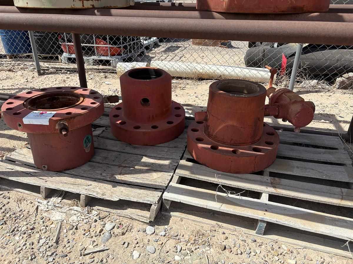 Used (2) 11”5k x 9-5/8” casing heads w/ (2) 11” multi bolt heads