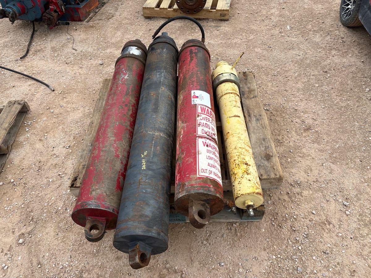 Used (4) hydraulic raising rams