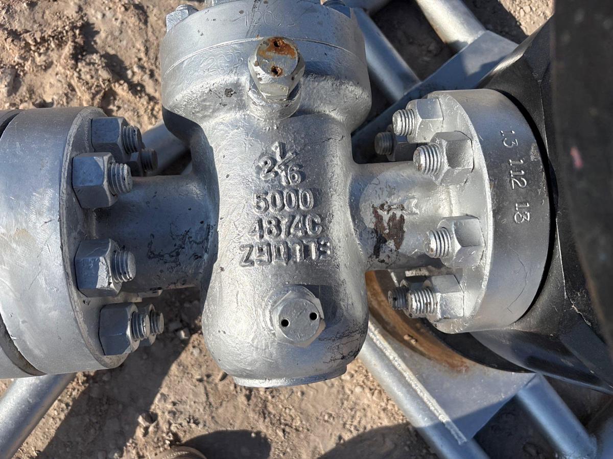 Used 7-1/16” x 2-1/16” fluid cross w/ (4) 2-1/16” 5k gate valves, transport skid