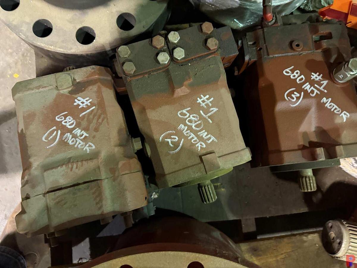 Used PALLET W/ (2) HR680 INJECTOR PLANETARIES, (3) 680 INJ HYD MOTORS, (1) REBUILT GEAR BOX BRAKE