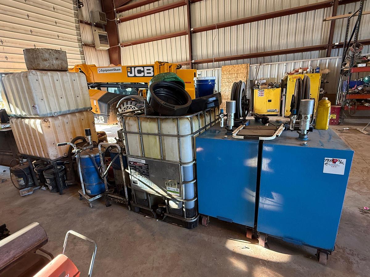 Used LOT W/ (2) 150-GALLON STEEL ROLLING OIL TANKS W/ AIR PUMPS, GUNS, & HOSES, (HAS SOME FLUID), (3) ROLLING LUBE BBLS, & RELATED
