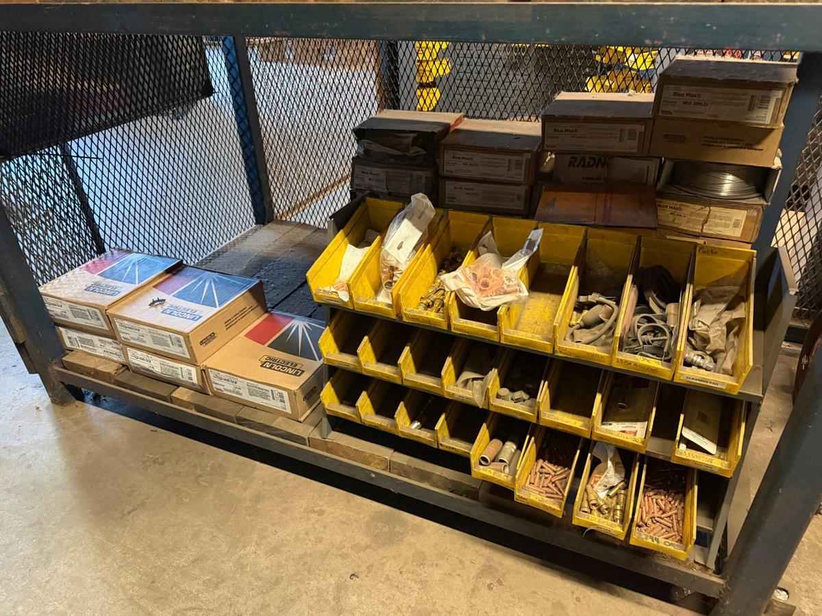 Used (3) Shelves W/ 30+ boxes of Lincoln Welding wire, New Gun Tips & Nozzles, & supplies