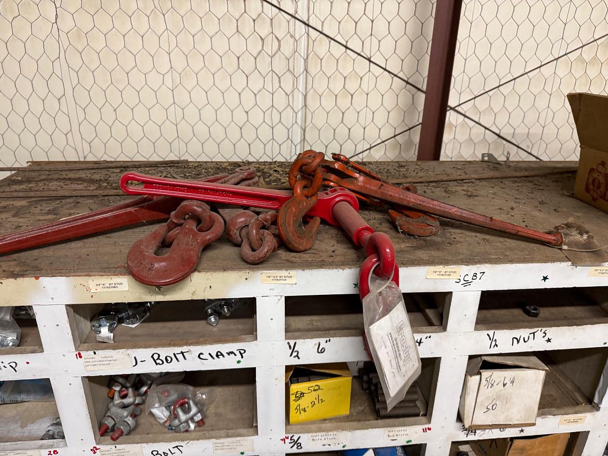 Used SECTION OF (50+)1/4” THRU 3/8” FIST GRIP U-BOLT CLAMPS, CHAIN HOOKS & BINDERS, SOME VICTAULIC COUPLINGS, ROD STRIPPER RUBBERS