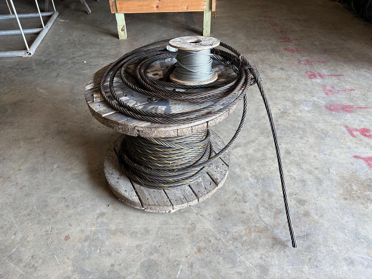 Used Spool of 7/8” wire rope & spool of 1/4” galvanized aircraft cable