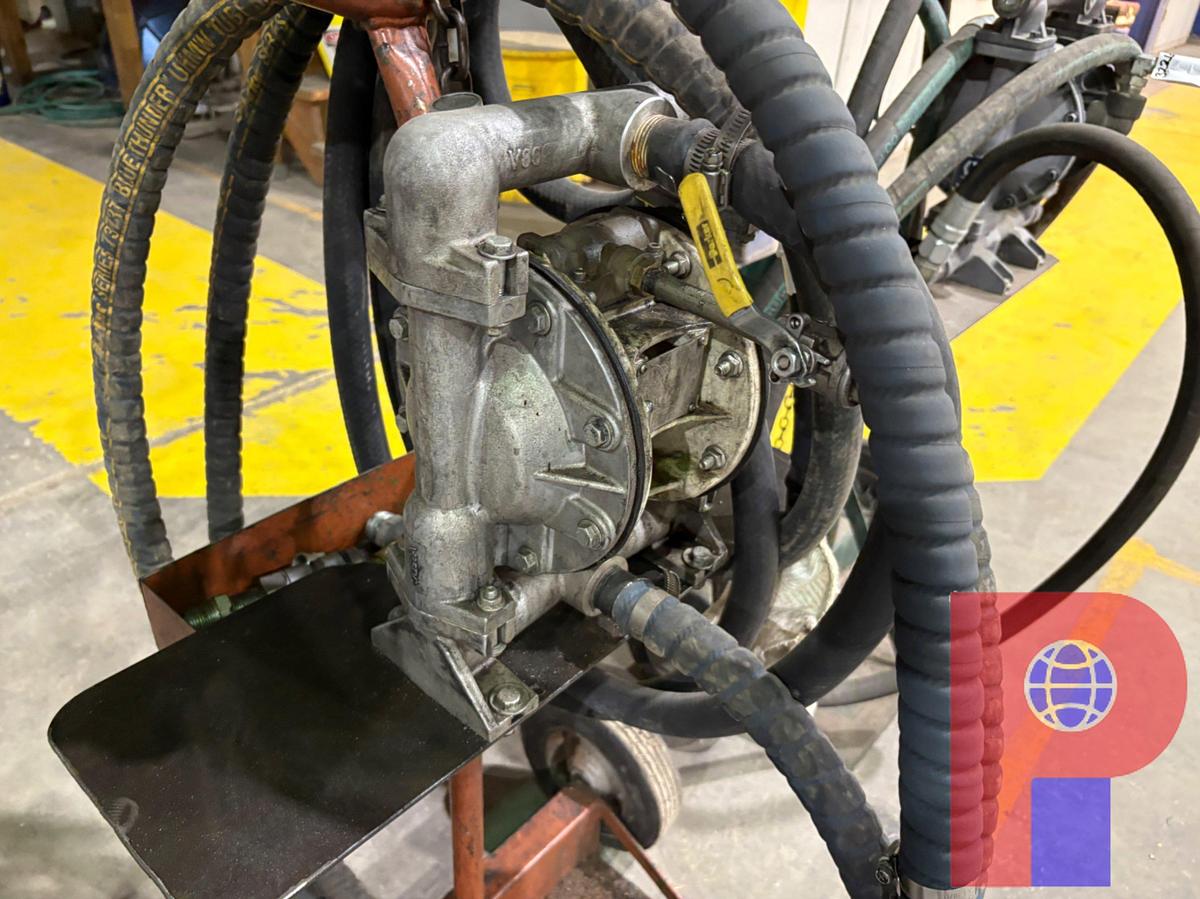 Used (2) GRACO PORTABLE DIAPHRAGM PUMPS W/ SUCTION HOSE & 2-WHEEL DOLLY