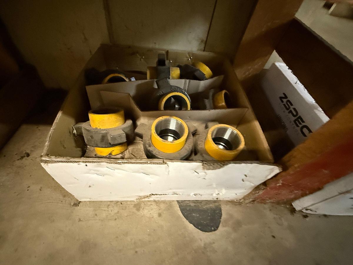 Used END CAP SECTION OF (50+) ZSPEC 2” FIG 100 PIPE UNIONS & PEG BOARD W/ VARIOUS STEEL CLAMPS