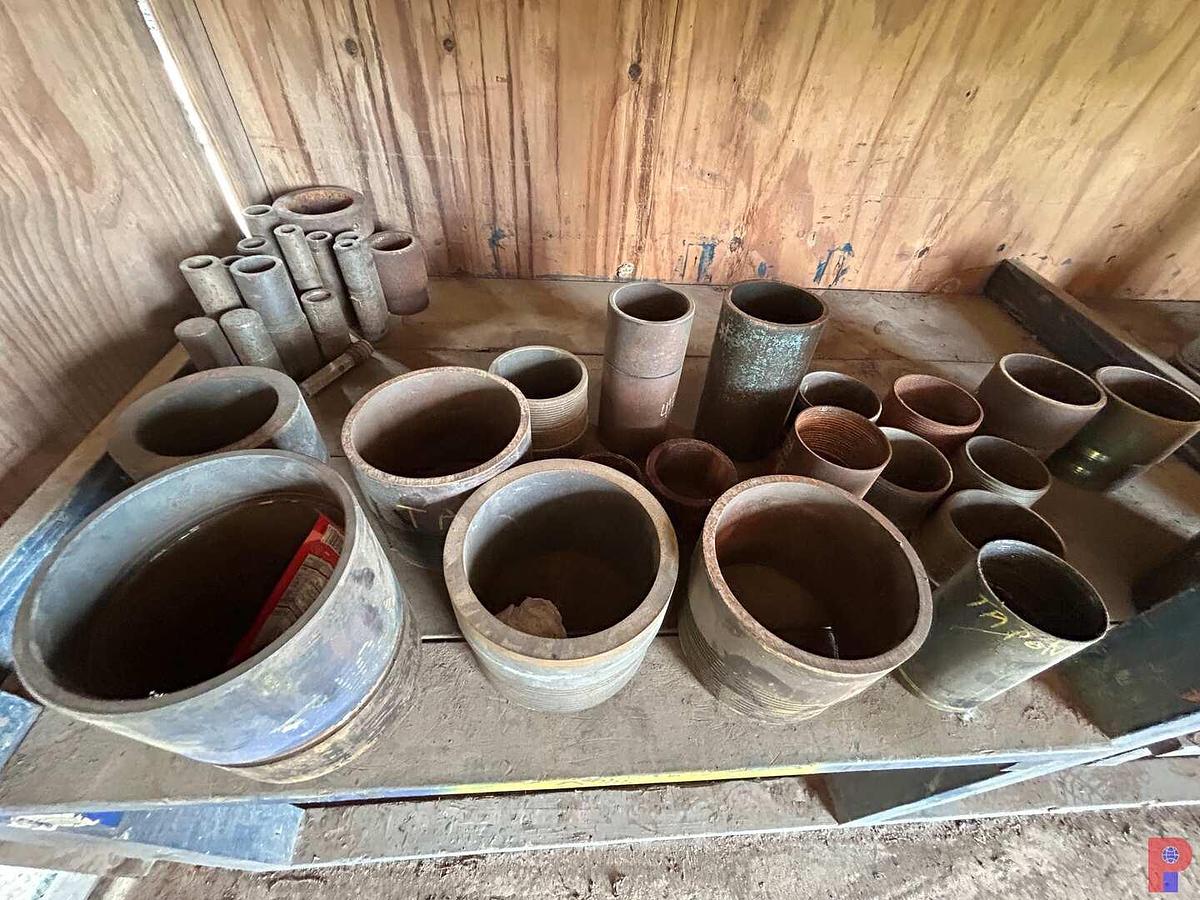 Used 2-SHELVES W/ (60 +) 1-1/2” - 8” STEEL THREAD PROTECTORS