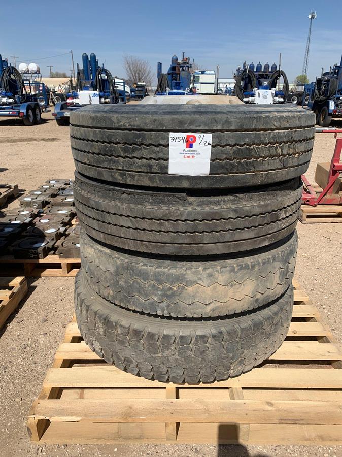 Used Pallets of 4 used Truck Tires W/ Aluminum Front Wheels